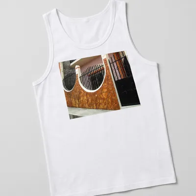 Photographic print of a Guatemalan home exterior in warm colors — printed on a tank top