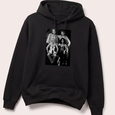 Vintage style T-shirt featuring ABBA pop group in black, white, and gray — printed on a unisex hoodie