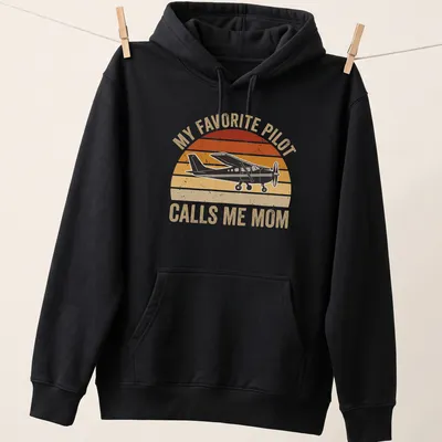 Retro distressed t-shirt with airplane graphic and text My Favorite Pilot Calls Me Mom — printed on a unisex hoodie