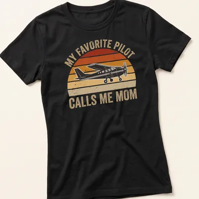 Retro distressed t-shirt with airplane graphic and text My Favorite Pilot Calls Me Mom — printed on a women's shirt