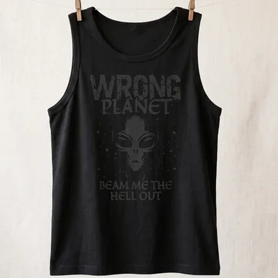 Vintage graphic featuring an alien with text about being on the wrong planet. — printed on a tank top