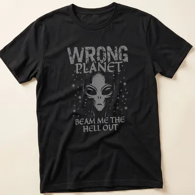 Vintage graphic featuring an alien with text about being on the wrong planet.