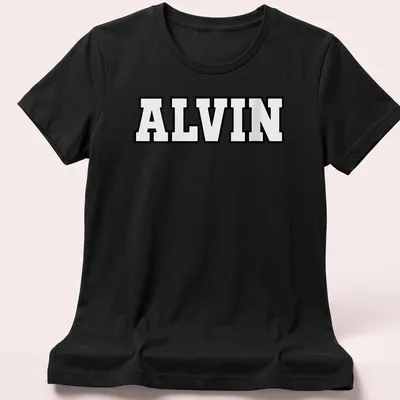 Bold black and white t-shirt featuring the name ALVIN in large text — printed on a women's shirt