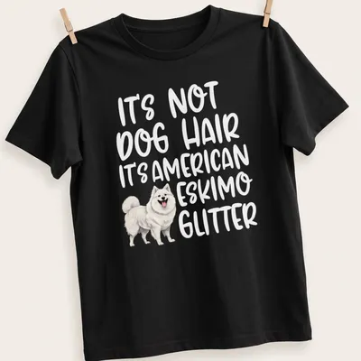 Illustrative t-shirt with an American Eskimo Dog and the text: It's Not Dog Hair It's American Eskimo Glitter