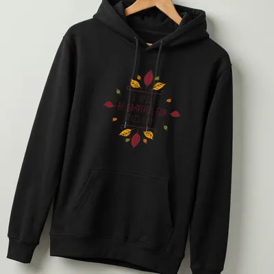 Whimsical autumn leaves with the text 'I WILL BE GRATEFUL FOR THIS DAY' — printed on a unisex hoodie