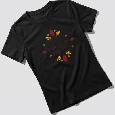 Whimsical autumn leaves with the text 'I WILL BE GRATEFUL FOR THIS DAY' — printed on a women's shirt