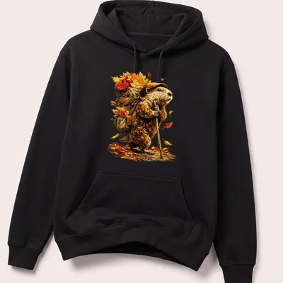 Colorful cartoon beaver hiking with autumn leaves in bright colors — printed on a unisex hoodie