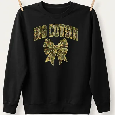 Cartoon style camouflage bow with bold 'BIG COUSIN' text in greens and browns — printed on a unisex sweatshirt