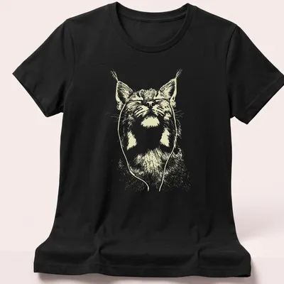 Minimalist line-art of a bobcat with earbuds in light yellow and white — printed on a women's shirt