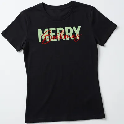 Modern calligraphy design saying Merry Bookmas for book lovers in festive colors — printed on a women's shirt