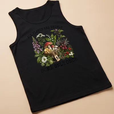 Vintage botanical illustration featuring various plants and mushrooms with text. — printed on a tank top