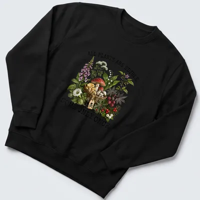Vintage botanical illustration featuring various plants and mushrooms with text. — printed on a unisex sweatshirt