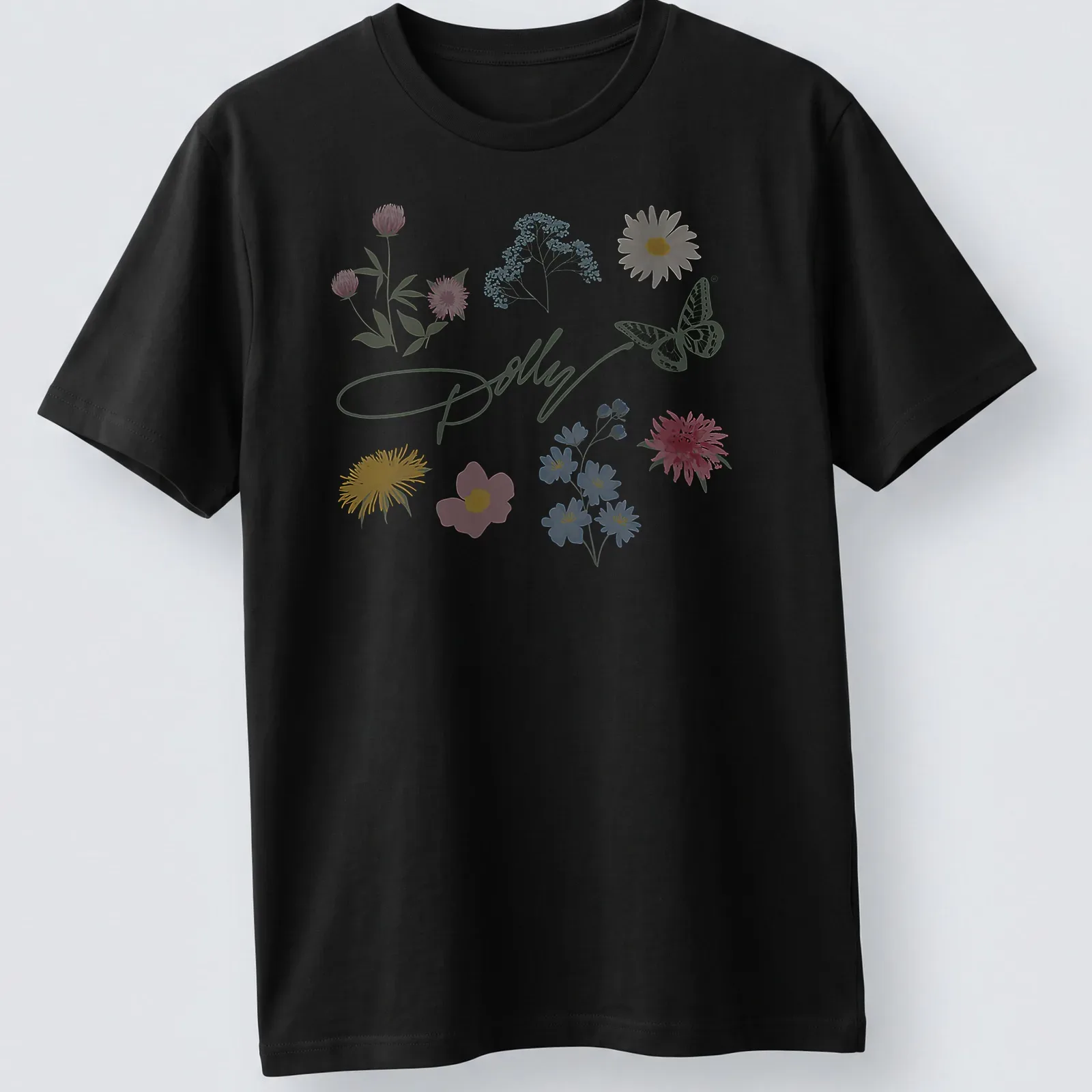 Charming pastel illustration of a butterfly and colorful flowers with Dolly signature — printed on a unisex t-shirt