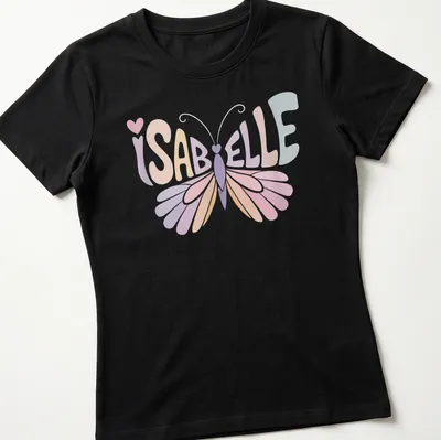 Vintage style t-shirt with the name Isabelle and a butterfly illustration in soft colors. — printed on a women's shirt