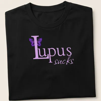 Illustration of a butterfly with the text 'Lupus sucks' in playful font.