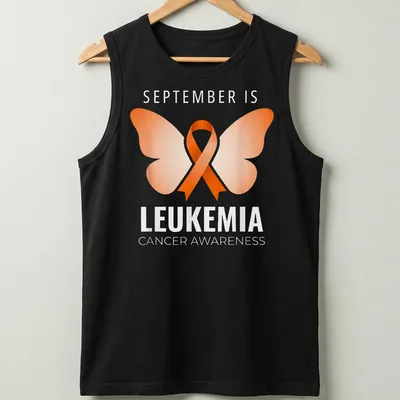 Butterfly graphic with text about leukemia cancer awareness in orange and white — printed on a tank top