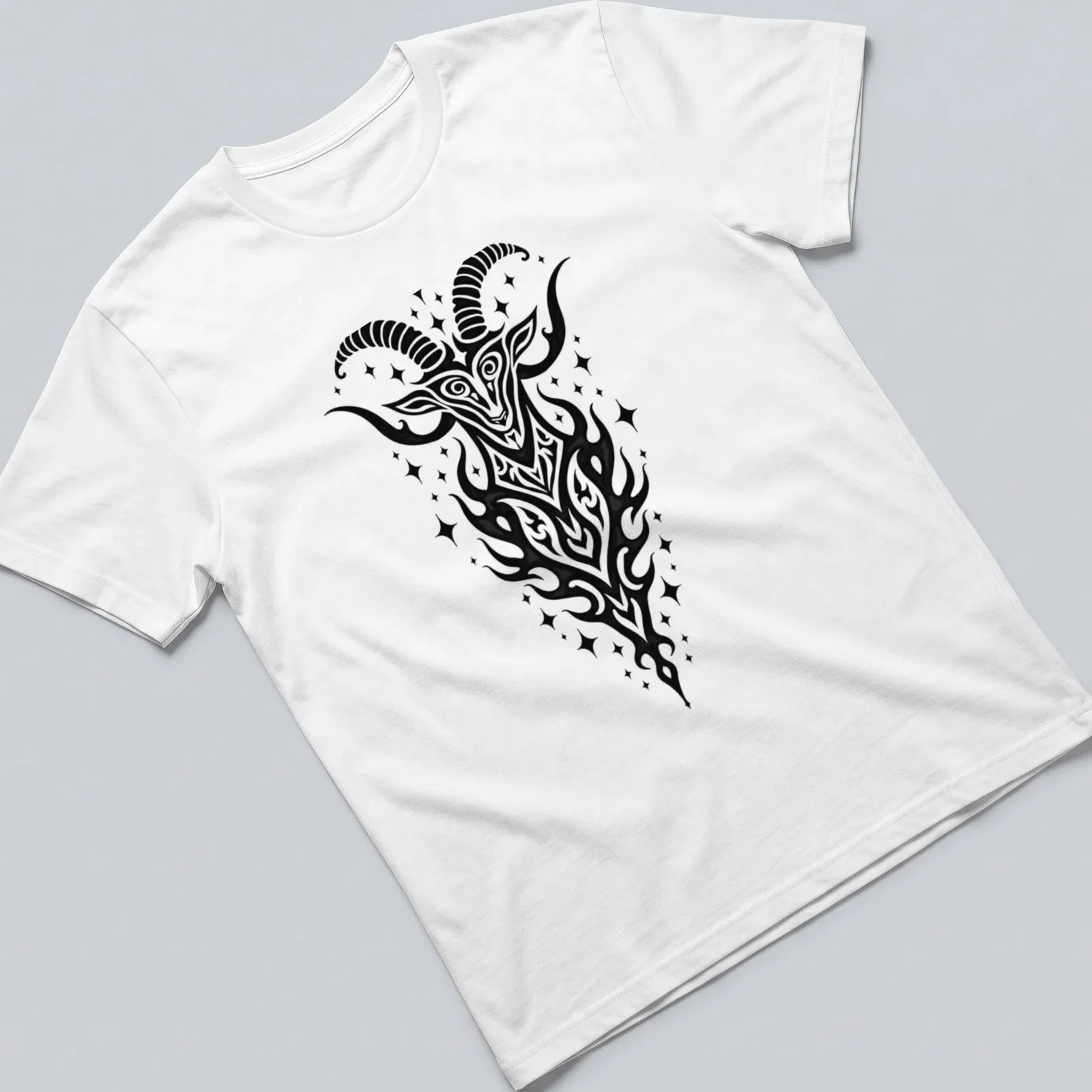 Bold tribal illustration of a Capricorn Sea Goat in black ink — printed on a unisex t-shirt
