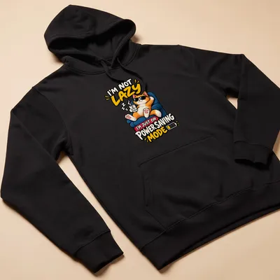 Colorful cartoon cat with coffee and humorous text about laziness — printed on a unisex hoodie