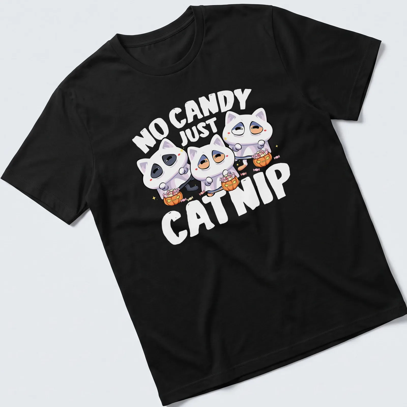 Kawaii shirt with cat ghosts and the text 'No Candy Just Catnip' in white, orange, pink, and black tones. — printed on a unisex t-shirt