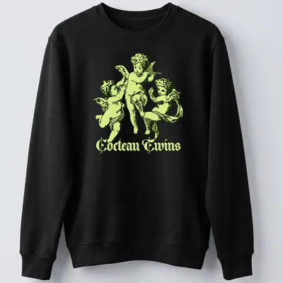 Vintage Cocteau Twins shirt featuring cherubic angels playing instruments — printed on a unisex sweatshirt