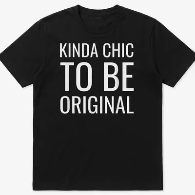 White t-shirt with the text 'KINDA CHIC TO BE ORIGINAL' in modern bold font.
