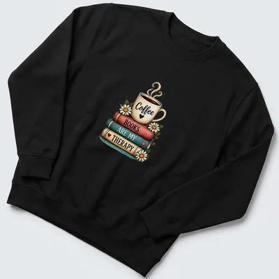 Whimsical illustration of a coffee cup atop a stack of colorful books with printed text — printed on a unisex sweatshirt
