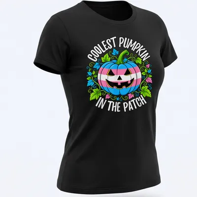 Colorful cartoon t-shirt featuring a pumpkin with trans pride colors — printed on a women's shirt