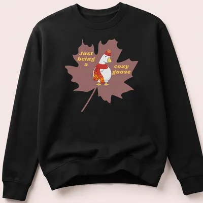 Cartoonish design of a cozy goose with playful text, warm colors — printed on a unisex sweatshirt