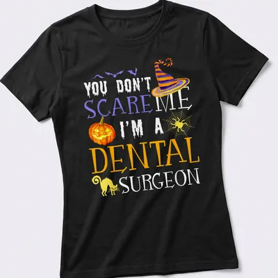 Whimsical Halloween shirt featuring a dental surgeon with playful text. — printed on a women's shirt