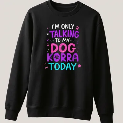 Colorful illustration of a dog named Korra with playful text above — printed on a unisex sweatshirt
