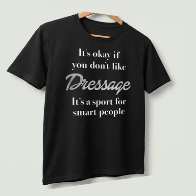 Glitter script t-shirt with text about Dressage humor — printed on a unisex t-shirt (angled view)