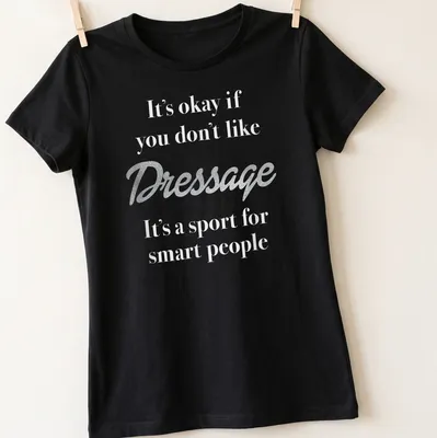Glitter script t-shirt with text about Dressage humor — printed on a women's shirt