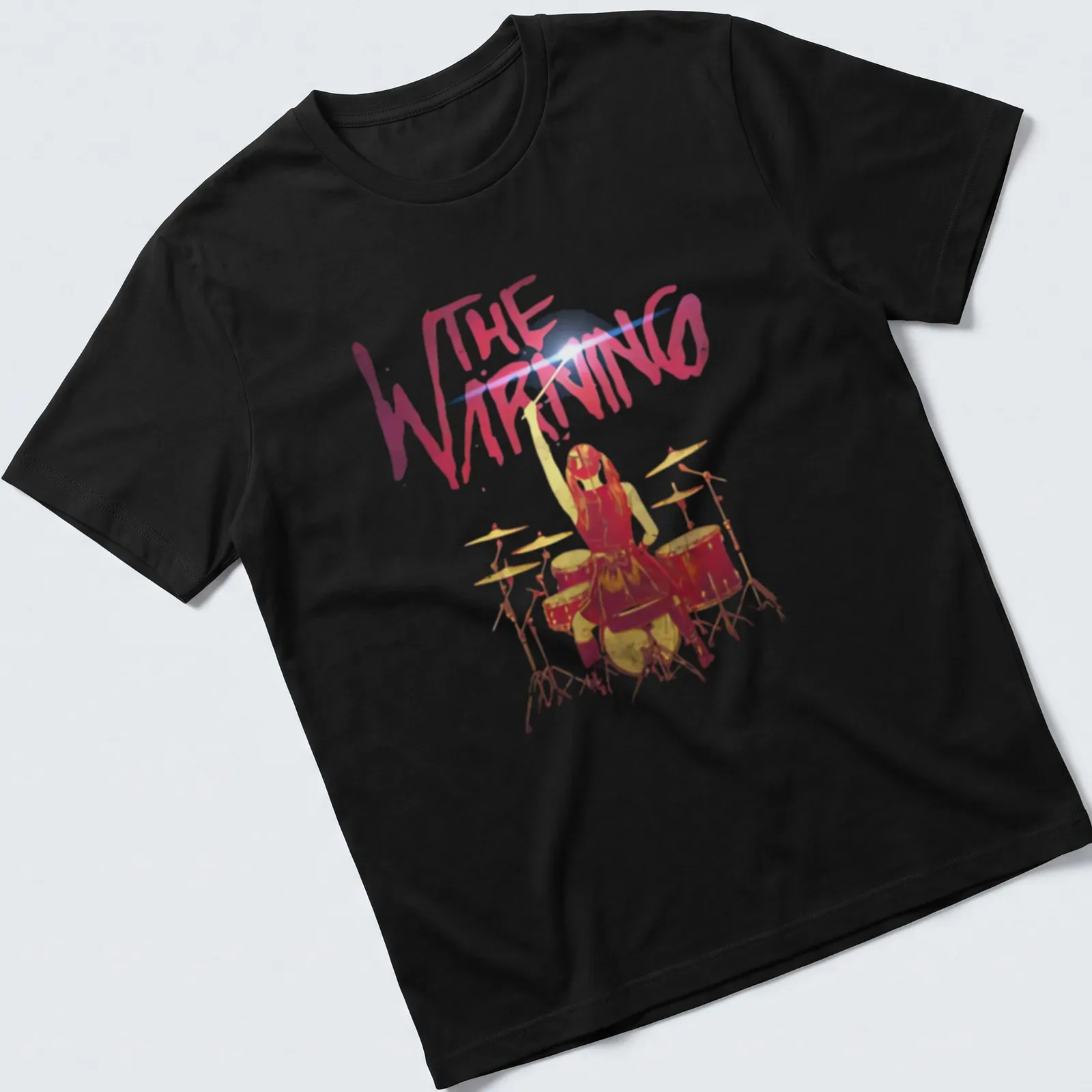 Watercolor print of a drummer girl with the text THE WARNING above her — printed on a unisex t-shirt