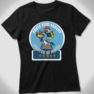 Cartoon graphic of Egbert with camera, colorful text above him. — printed on a women's shirt