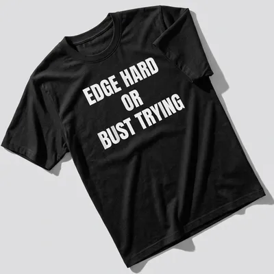 Bold typography t-shirt with the quote 'EDGE HARD OR BUST TRYING' on a white background