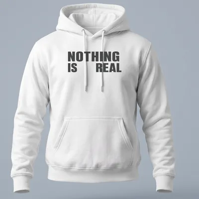 Minimalist typography t-shirt with black and white design stating 'NOTHING IS REAL' — printed on a unisex hoodie