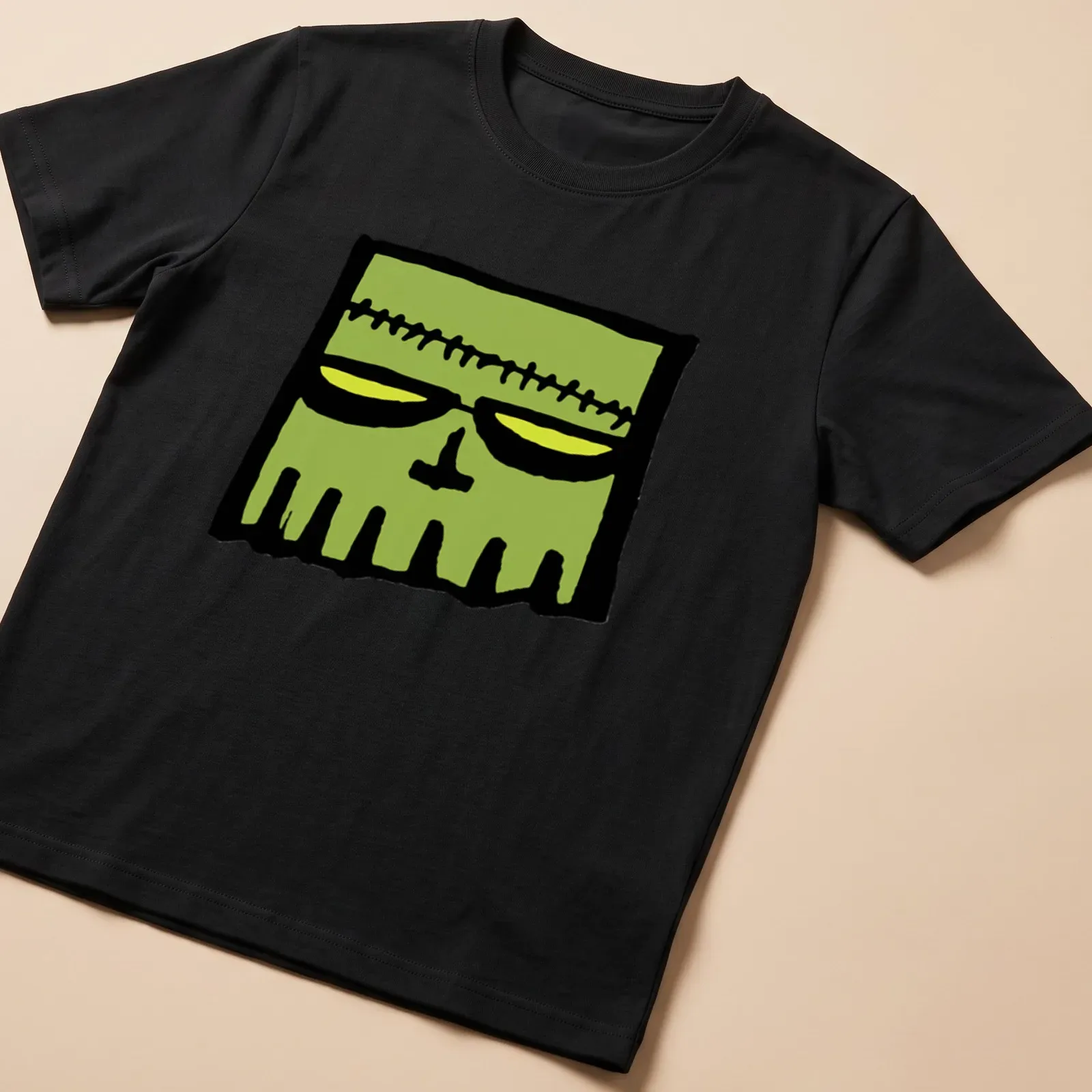 Cartoonish Frankenstein skull in green, black, and yellow colors — printed on a unisex t-shirt