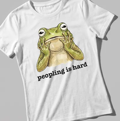Cartoon frog with text 'peopling is hard' in a funny introvert — printed on a women's shirt