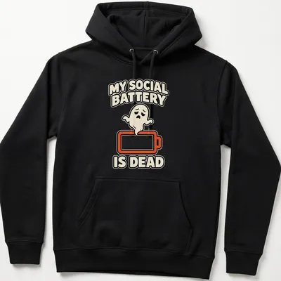Cartoon ghost design with text 'MY SOCIAL BATTERY IS DEAD' in black and orange — printed on a unisex hoodie