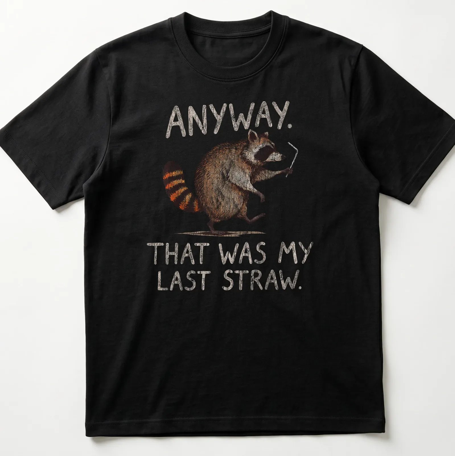 Whimsical illustration of a raccoon with text: Anyway. That was my last straw. — printed on a unisex t-shirt