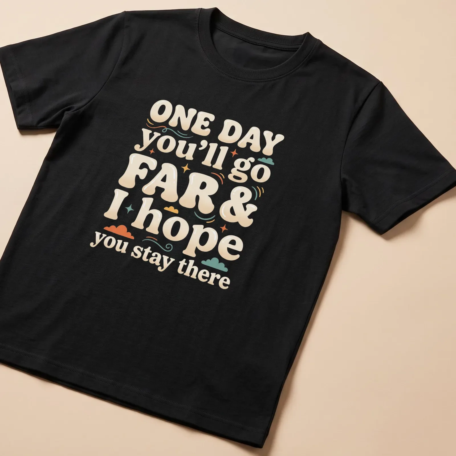 Playful bubble lettering with the phrase about going far and staying there in multiple colors. — printed on a unisex t-shirt