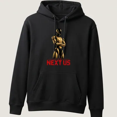 Futuristic humanoid robot silhouette with bold text 'THE NEXT US' in gold and black — printed on a unisex hoodie