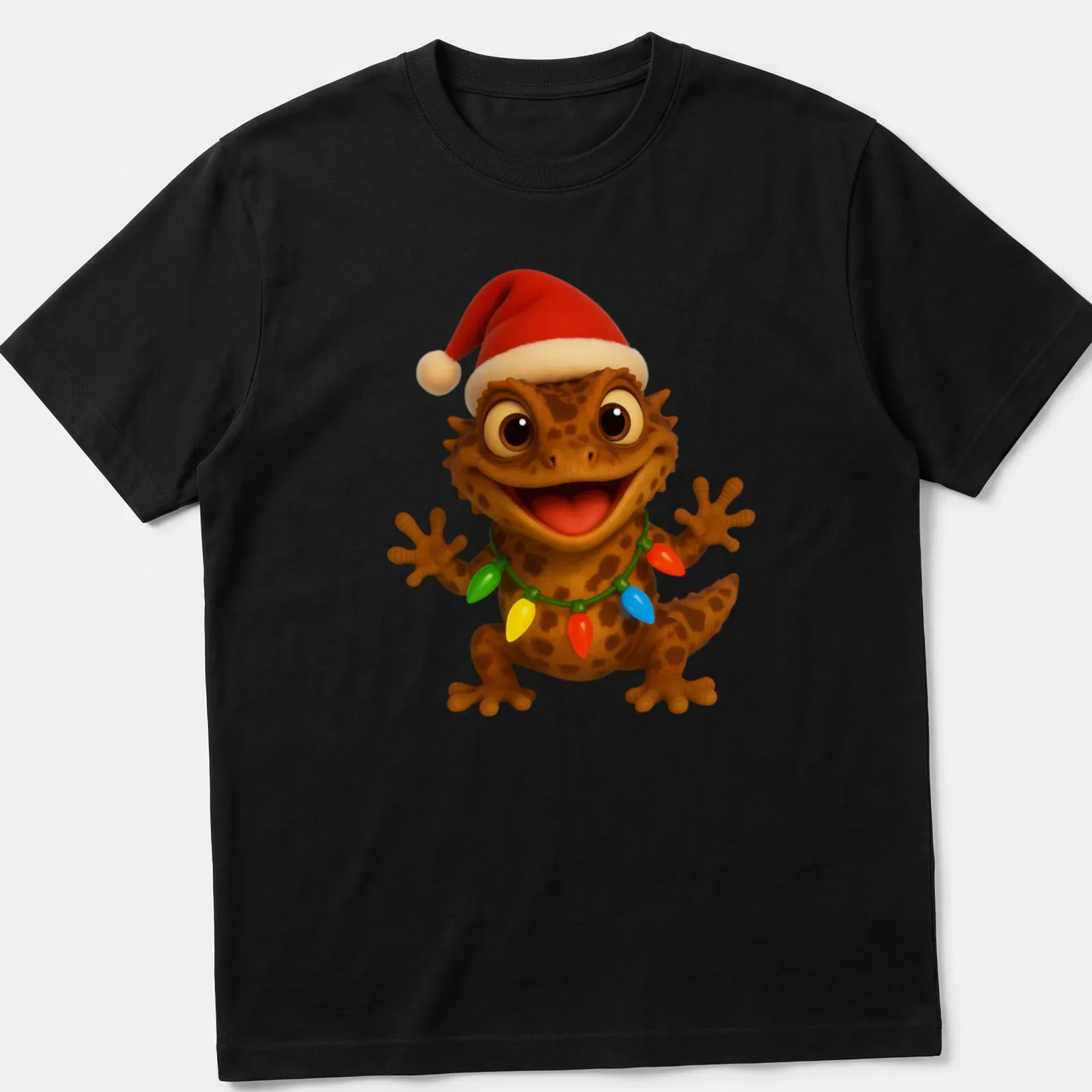 Cartoon Gargoyle Gecko adorned with colorful Christmas lights in festive colors. — printed on a unisex t-shirt