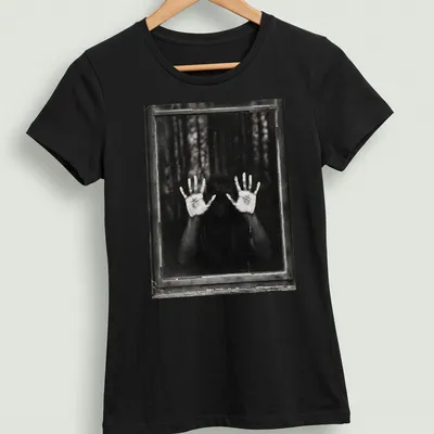 Illustration of ghostly hands emerging from a dark background in monochrome. — printed on a women's shirt