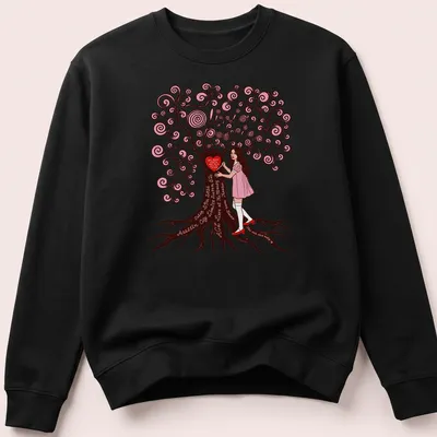 Whimsical illustration of a girl by a tree with a printed phrase about love. — printed on a unisex sweatshirt