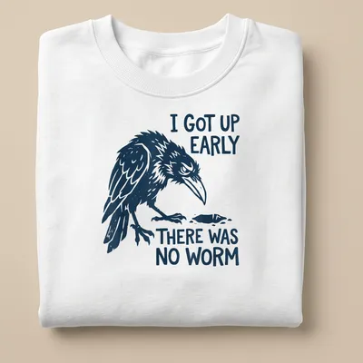 Bold illustration of a grumpy raven with text about early rising and no worm — printed on a unisex sweatshirt