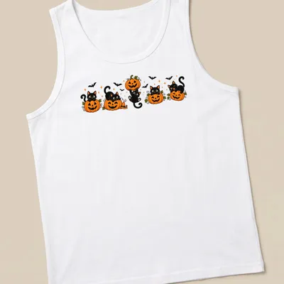 Kawaii cartoon of black cats with pumpkins in orange, black, green, and white — printed on a tank top