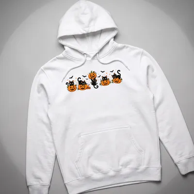Kawaii cartoon of black cats with pumpkins in orange, black, green, and white — printed on a unisex hoodie
