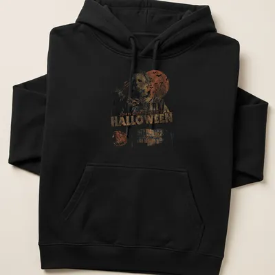 Vintage distressed Halloween t-shirt featuring Michael Myers and classic horror film text — printed on a unisex hoodie