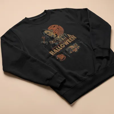 Vintage distressed Halloween t-shirt featuring Michael Myers and classic horror film text — printed on a unisex sweatshirt